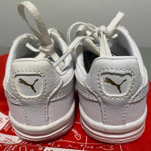 all white pumas womens